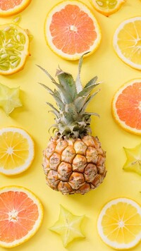 Ananas i plasterki owoców cytrusowych