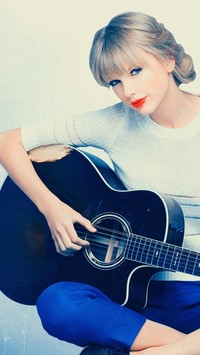 Taylor Swift z gitarą