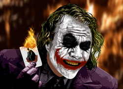Joker palący kartę z wizerunkiem Batmana na tle ognia