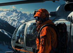 Mężczyzna obok helikoptera i zaśnieżone góry