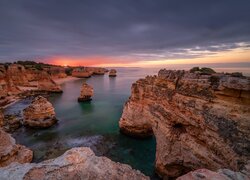 Wybrzeże, Skały, Zachód słońca, Morze, Region Algarve, Portugalia