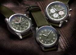 Trzy szwajcarskie zegarki marki Breitling z paskami