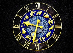 Zegar ze znakami zodiaku na tle rozgwieżdżonego nieba