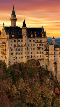 Zamek Neuschwanstein o zachodzie słońca