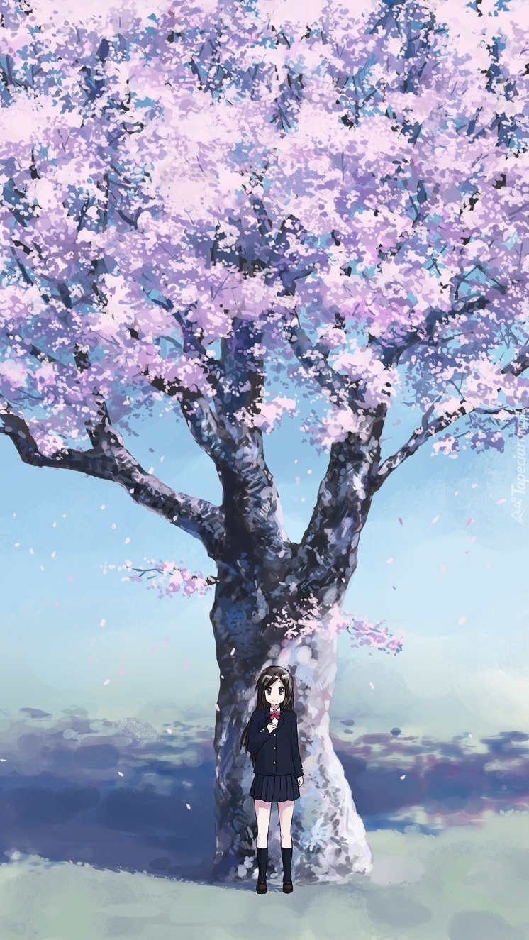 Dziewczynka pod kwitnącą wiśnią