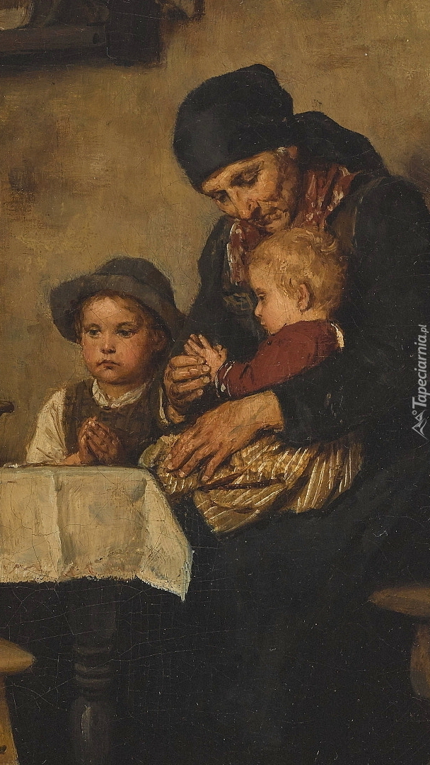 Modląca się przy stole kobieta z dziećmi