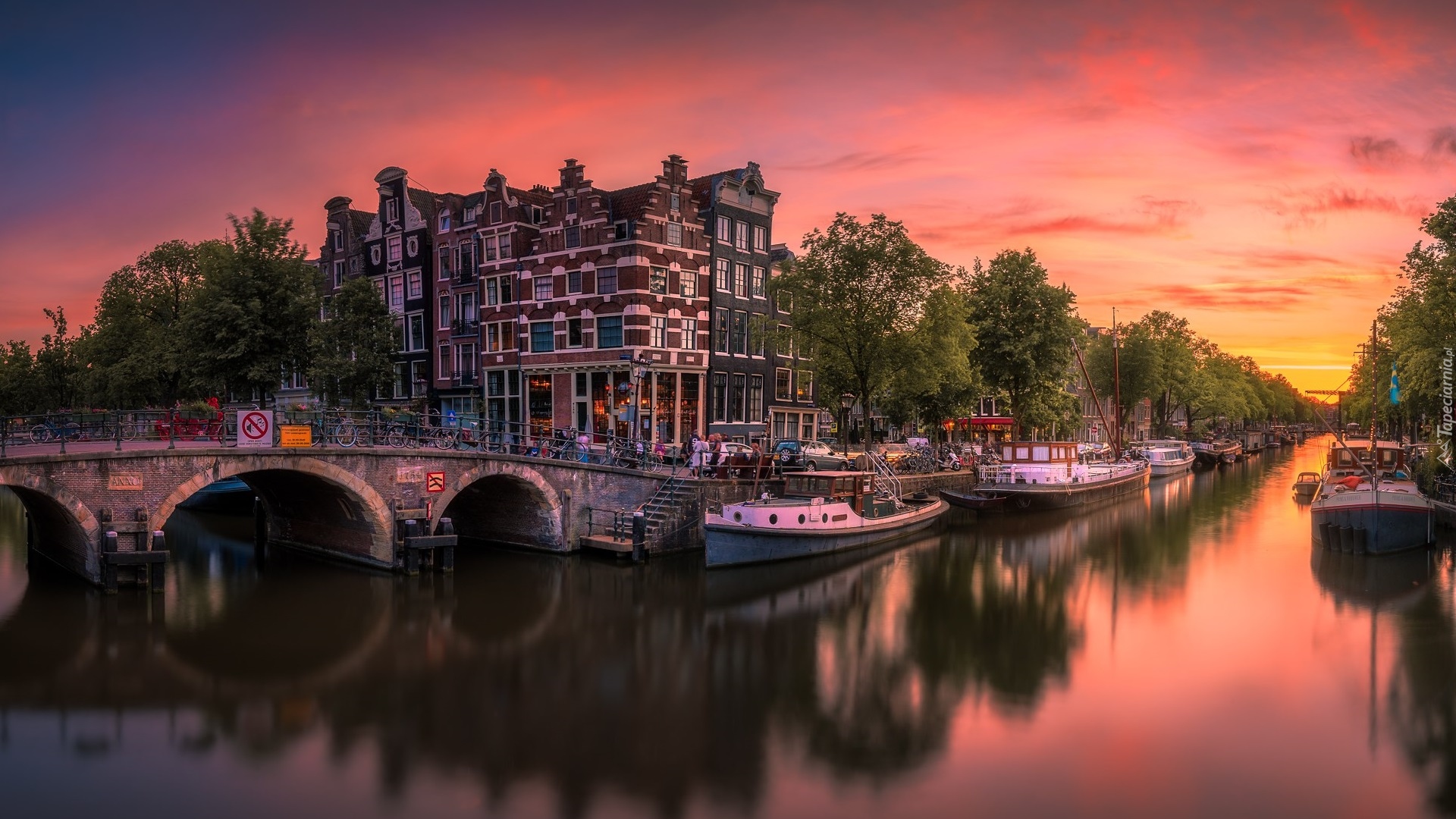 Holandia, Amsterdam, Kanał, Rzeka, Łódki, Most, Drzewa, Domy, Zachód słońca