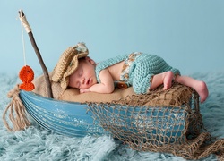 Dziecko zasnęło na łódce