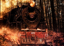Iskry i ogień wokół lokomotywy z wagonami