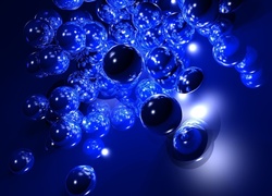 Niebieskie rozświetlone kule w grafice 3D