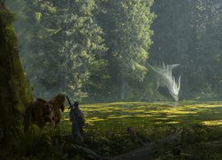 Rycerz z koniem nad rzeką w lesie