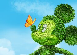 Zielona postać Myszki Miki z motylem na nosie